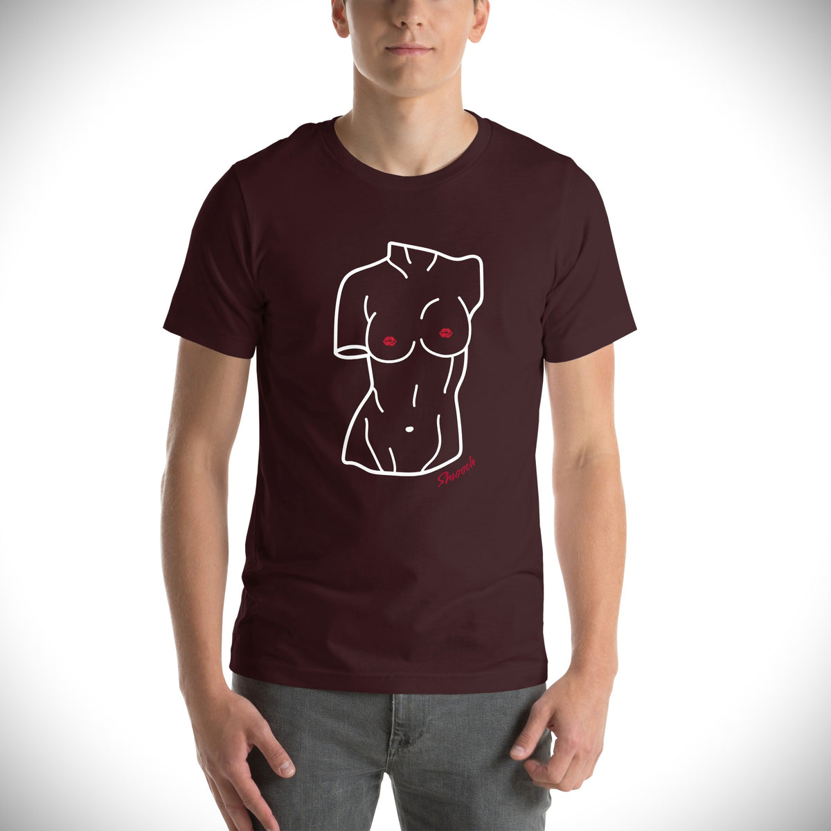 Model is wearing front-facing graphic T-shirt in color oxblood reddish black, featuring a woman's bust sculpture outlined in white with red lip shaped nipples, and the word 'Smooch' in red print, from What Was Said (Statement Apparel + More). 