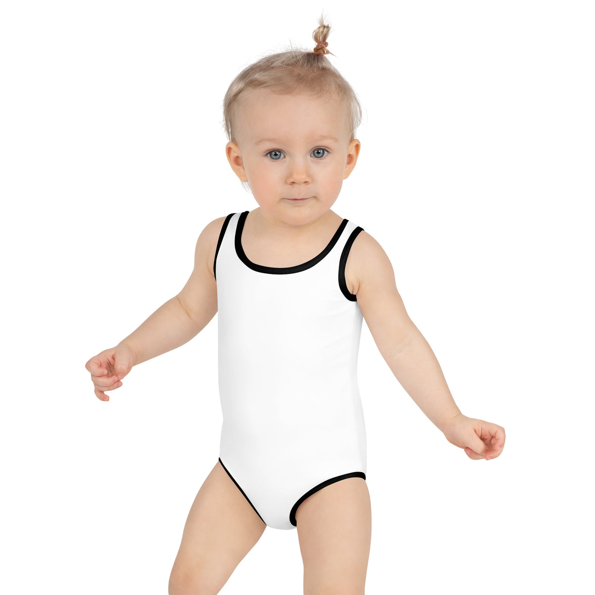 Model is wearing front facing kids graphic one-piece swimsuit in color white with black trim, from What Was Said (Statement Apparel + More).