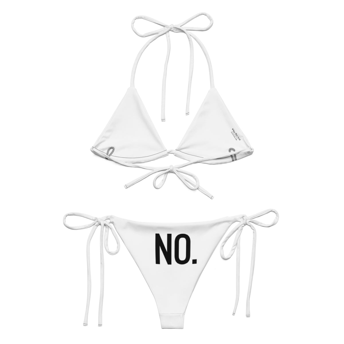 Back facing graphic string bikini swimsuit in color white, featuring the statement 'NO.' in bold black print on the bikini back bottoms. From What Was Said (Statement Apparel + More).