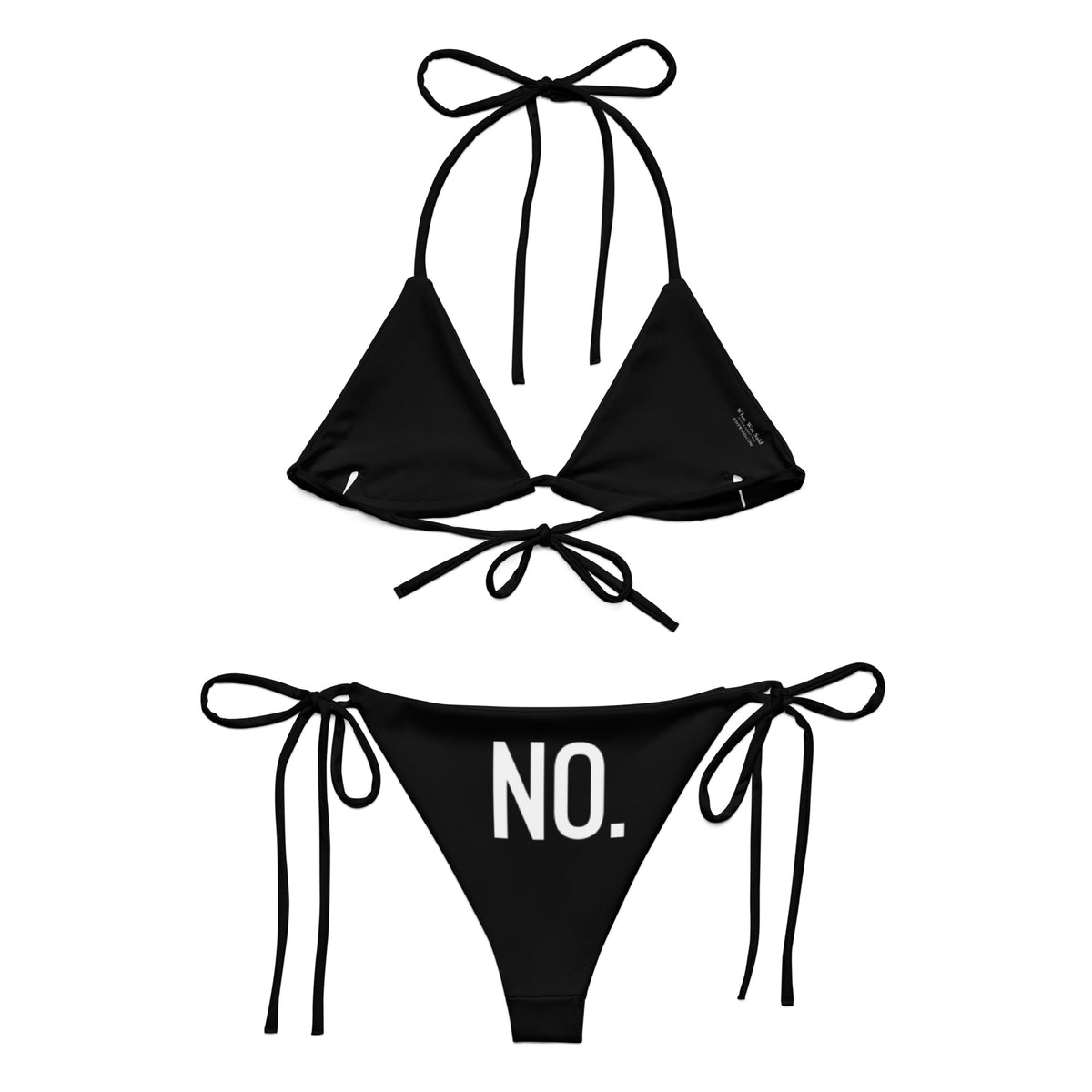 Back facing graphic string bikini swimsuit in color black, featuring the statement 'NO.' in bold white print on the bikini bottoms. From What Was Said (Statement Apparel + More).