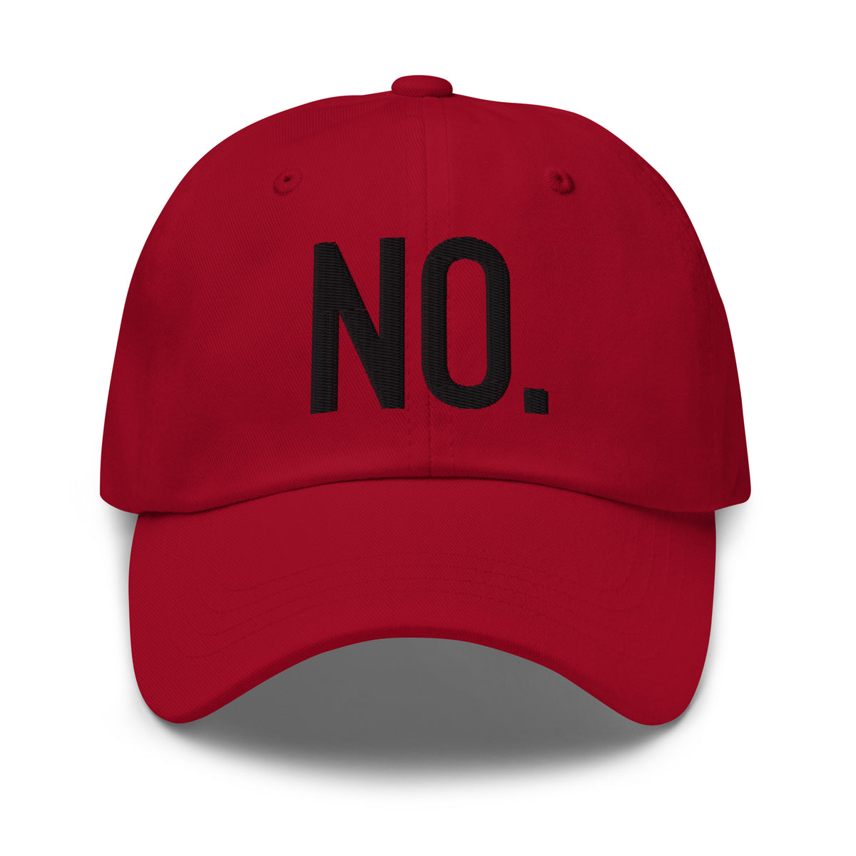 Model is wearing front facing graphic dad hat in color cranberry red, featuring the statement 'NO.' in bold black embroidery. From What Was Said (Statement Apparel + More).
