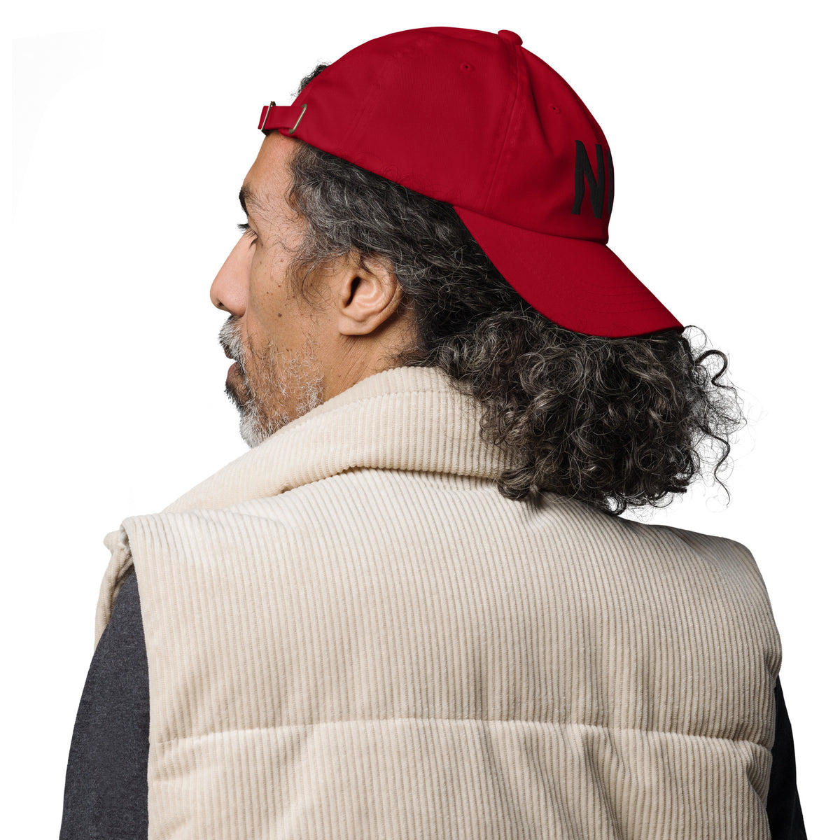 Model is wearing right front facing graphic dad hat in color cranberry red, featuring the statement 'NO.' in bold black embroidery. From What Was Said (Statement Apparel + More).