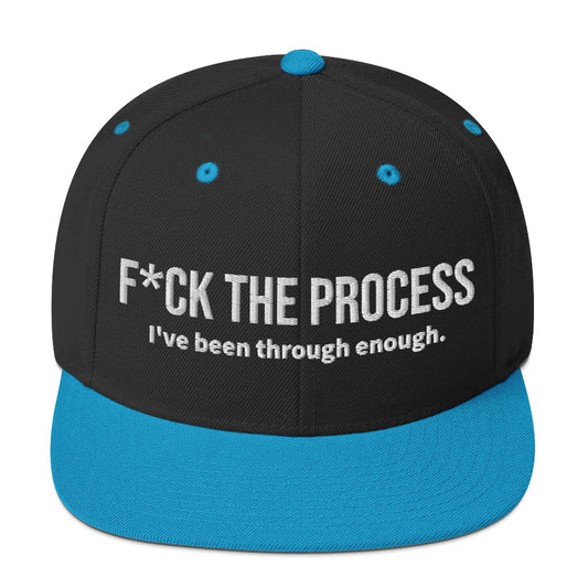 Front facing graphic snapback hat in color black and teal, featuring the statement 'FUCK THE PROCESS, I've Been Through Enough,' in bold white embroidery. From What Was Said (Statement Apparel + More).