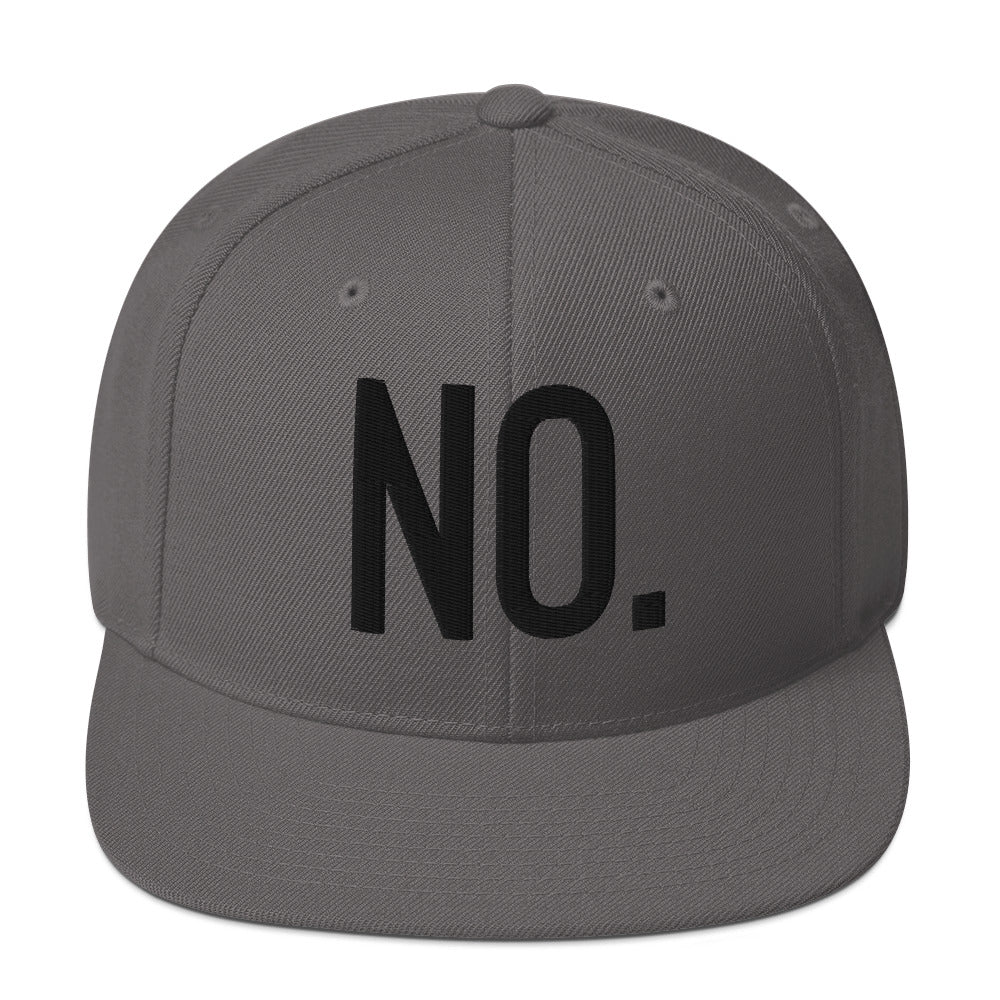 Front facing graphic snapback hat in color dark grey, featuring the statement 'NO.' in bold black embroidery. From What Was Said (Statement Apparel + More).