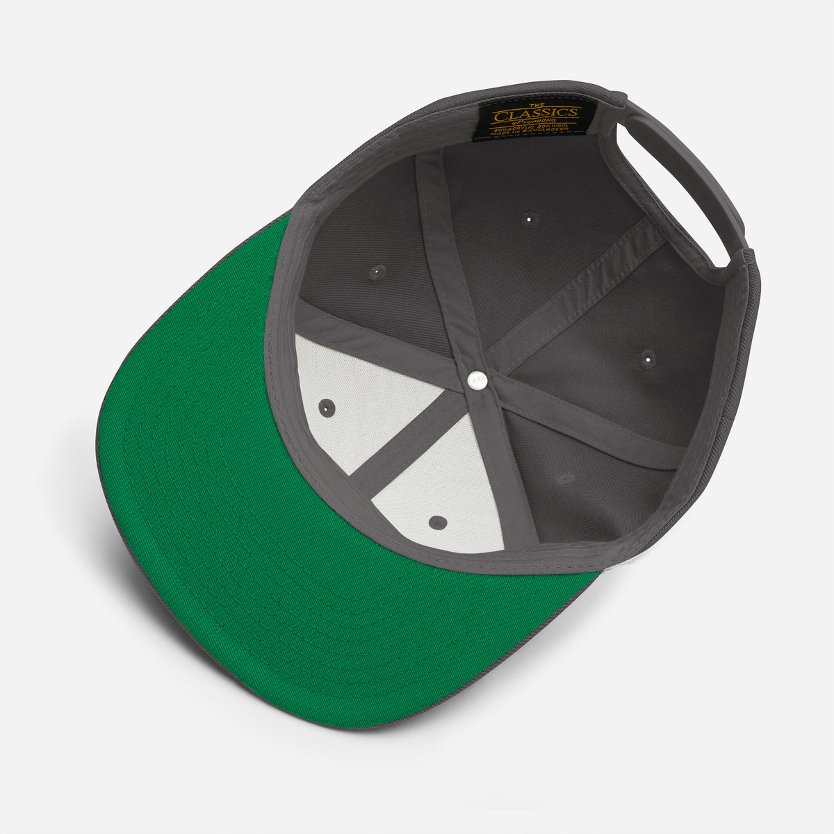 Product details of the underside of graphic snapback hat in color dark grey. Featuring the underside view of the hat and the hats green underside brim. From What Was Said (Statement Apparel + More).