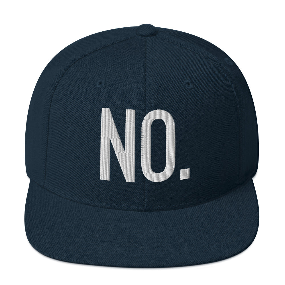 Front facing graphic snapback hat in color dark navy blue, featuring the statement 'NO.' in bold white embroidery. From What Was Said (Statement Apparel + More).