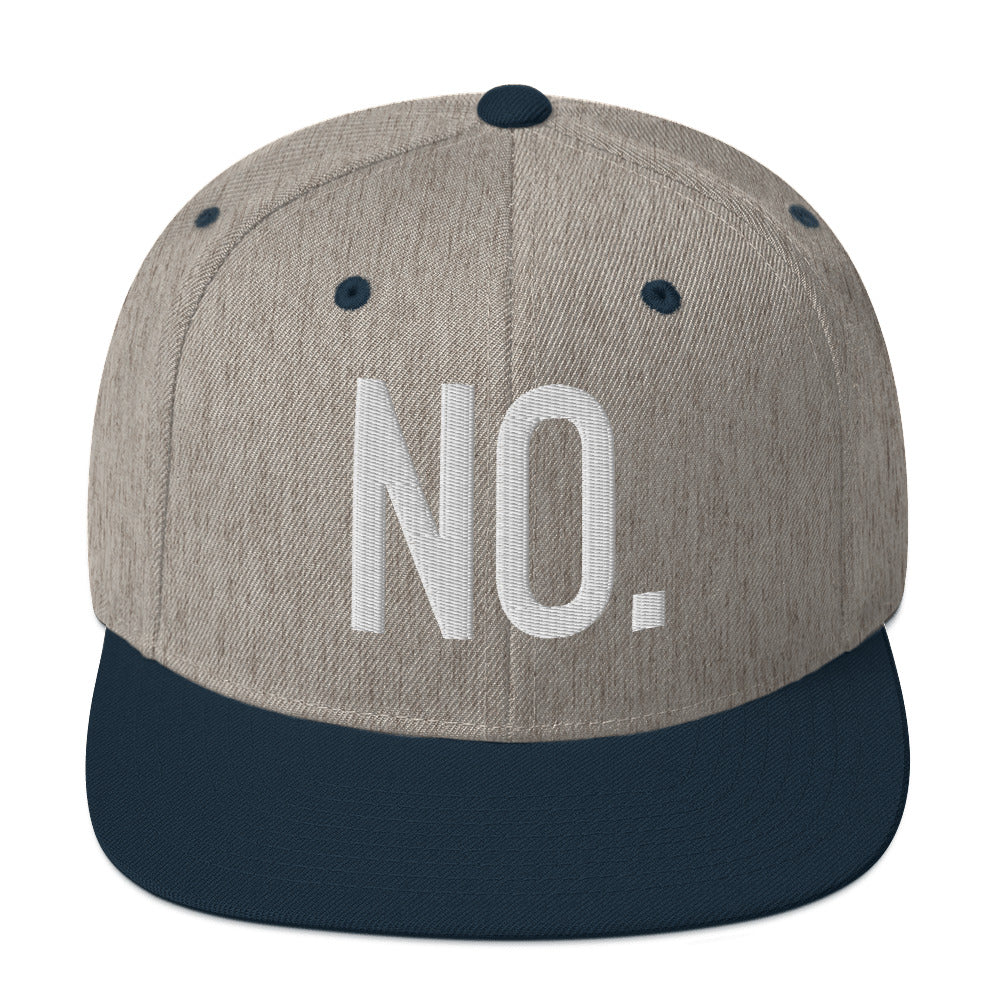Front facing graphic snapback hat in color heather grey and navy blue, featuring the statement 'NO.' in bold white embroidery. From What Was Said (Statement Apparel + More).