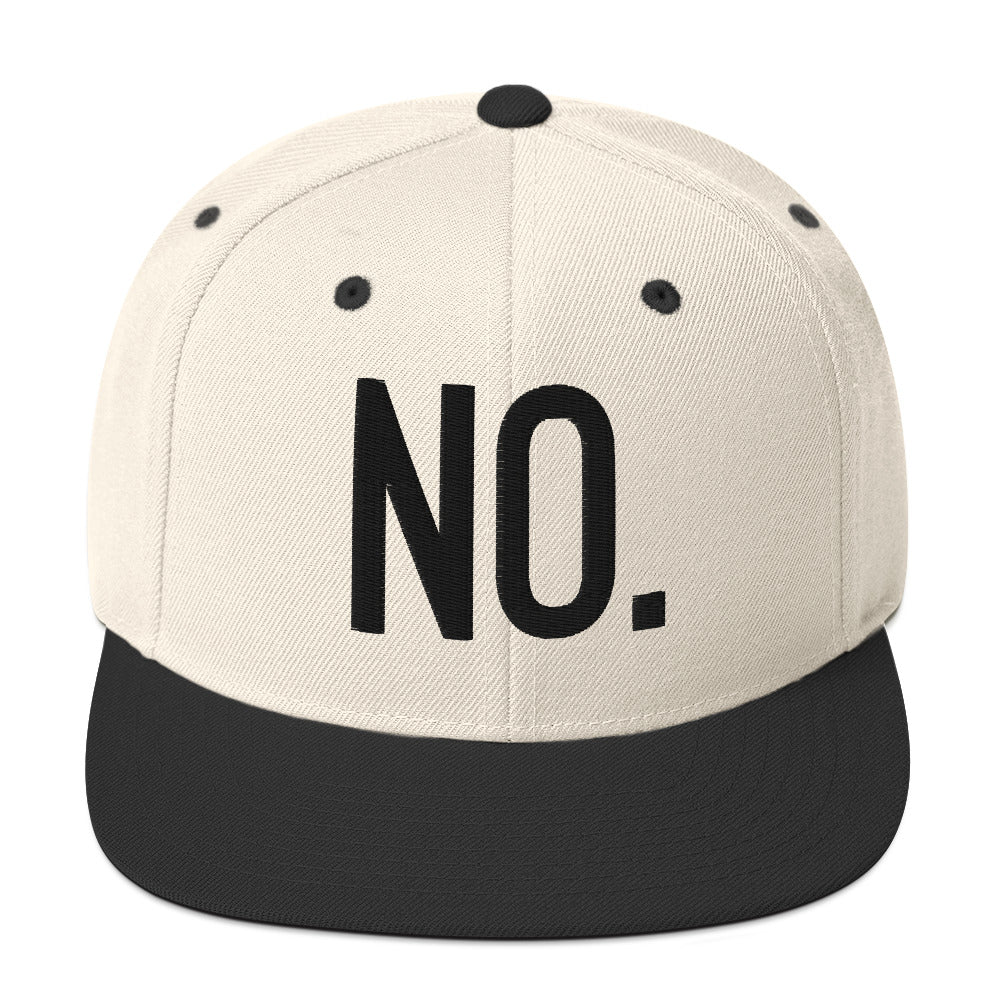 Front facing graphic snapback hat in color natural and black, featuring the statement 'NO.' in bold black embroidery. From What Was Said (Statement Apparel + More).
