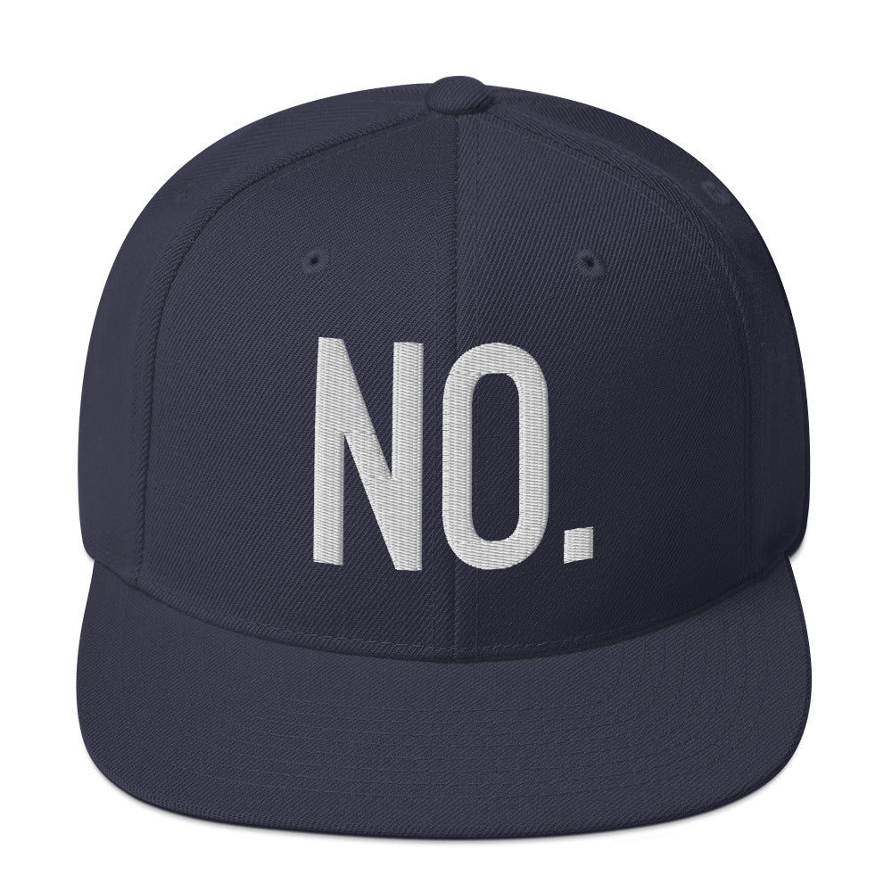 Front facing graphic snapback hat in color navy blue, featuring the statement 'NO.' in bold white embroidery. From What Was Said (Statement Apparel + More).