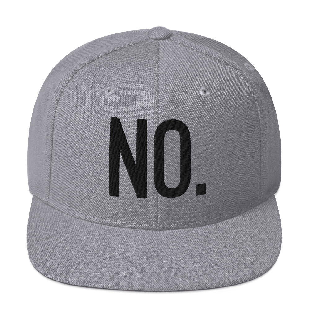 Front facing graphic snapback hat in color silver light grey, featuring the statement 'NO.' in bold black embroidery. From What Was Said (Statement Apparel + More).