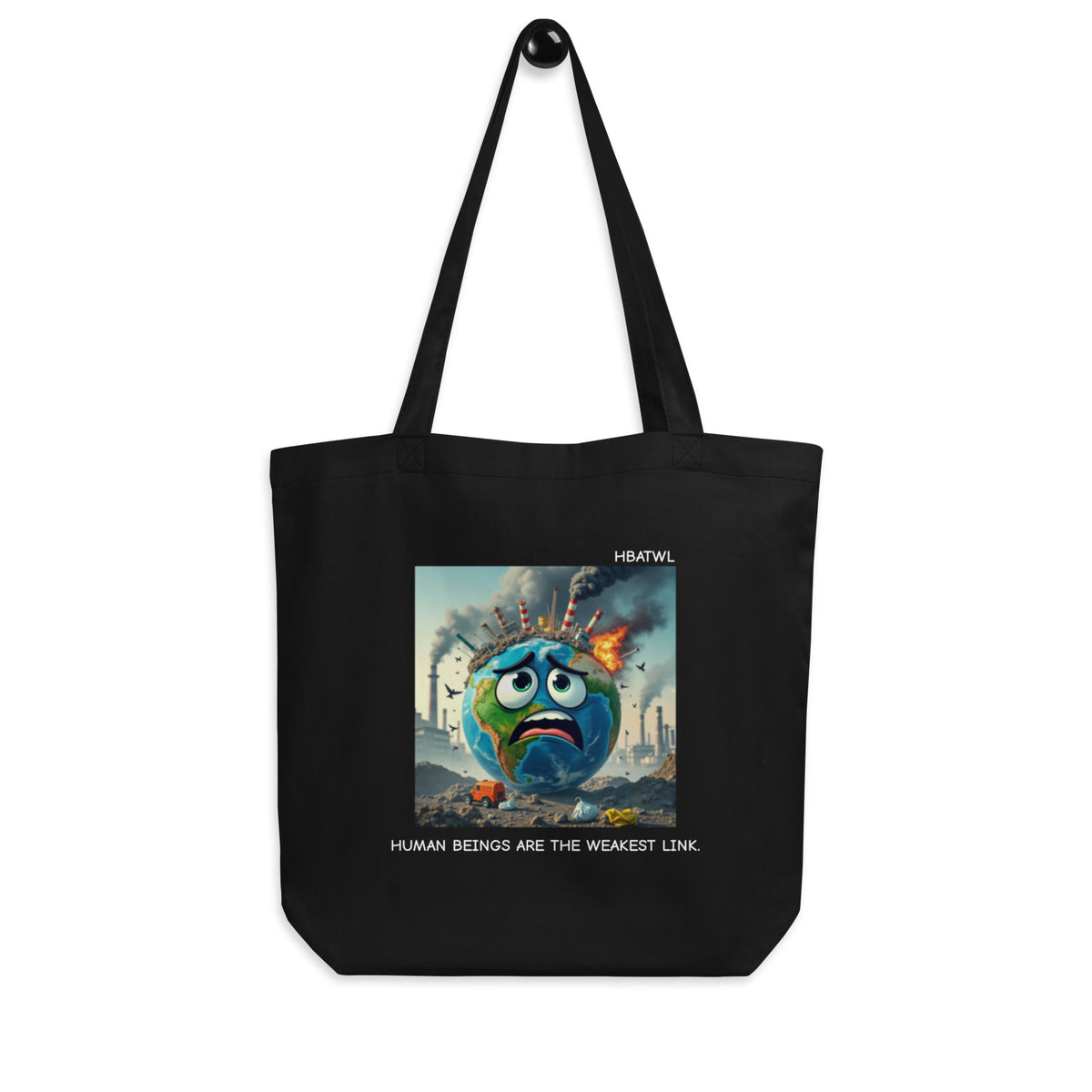 Front-facing graphic eco tote bag in color black hanging from hook, featuring an animated earth with facial expression of concern over being negatively effected by human pollution. Bold statement on the bag reads, 'Human Beings Are The Weakest link.', in white print. From What Was Said (Statement Apparel + More). 