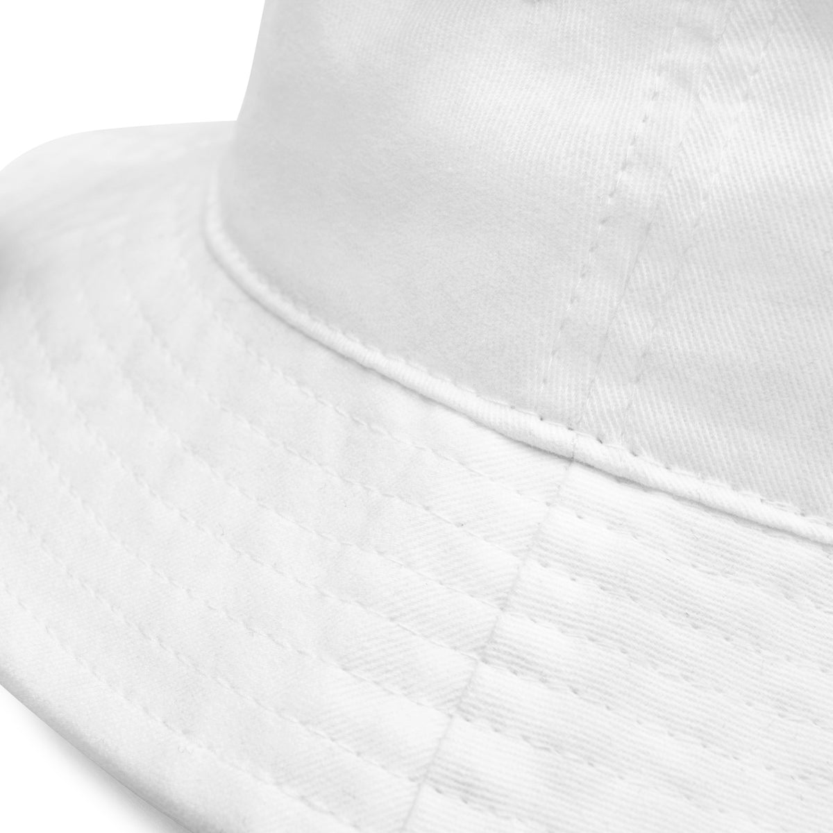 Product detail of graphic bucket hat in color white, featuring quality stitching on hats brim. From What Was Said (Statement Apparel + More).