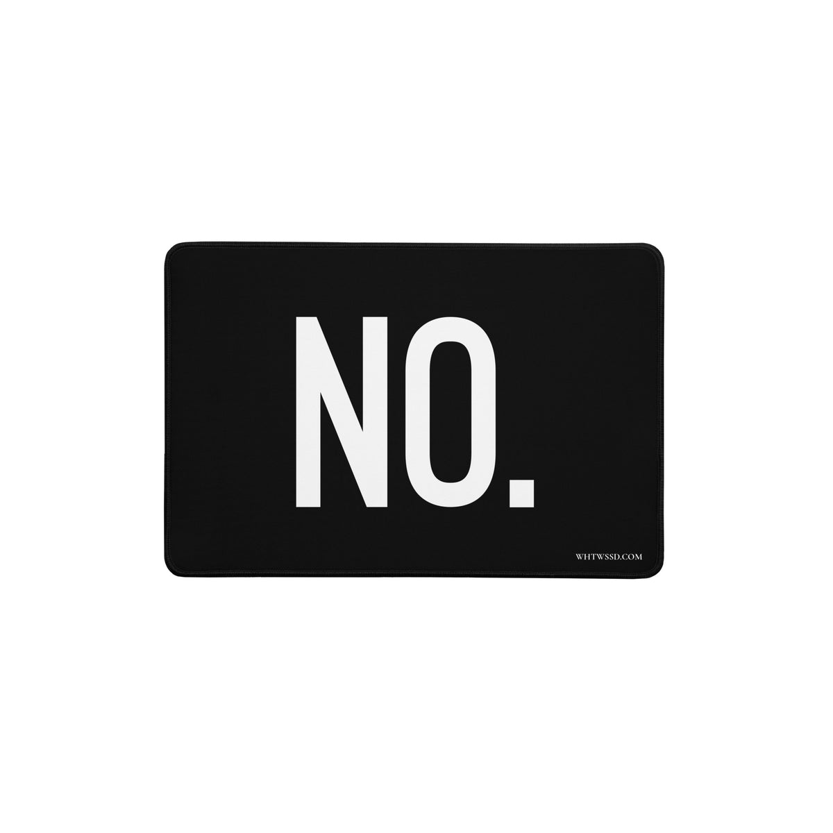Front facing 12x18 graphic desk mat in color black, against a white background, featuring the statement 'NO.' in bold white print, and brand website, WHTWSSD.COM, in small print in the bottom left corner. From What Was Said (Statement Apparel + More). 