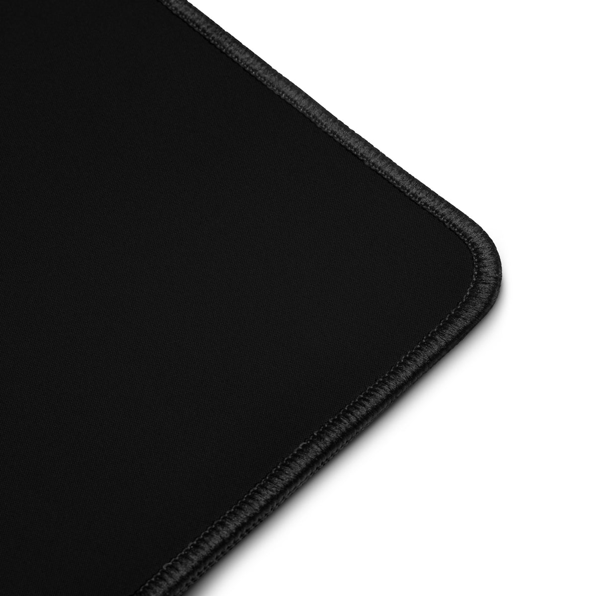Product detail of 12x18 graphic desk mat in color black, against white background. Featuring anti-slip natural rubber base backing. From What Was Said (Statement Apparel + More). 