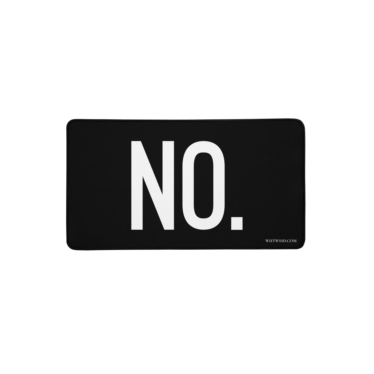 Front facing 12x22 graphic desk mat in color black, against a white background, featuring the statement 'NO.' in bold white print, and brand logo website, WHTWSSD.COM, in small print in the bottom left corner. From What Was Said (Statement Apparel + More). 