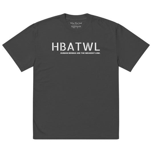 Front facing oversized fit graphic t-shirt in color faded black, featuring initialism HBATWL, and statement 'HUMAN BEINGS ARE THE WEAKEST LINK', in bold white print. From What Was Said (Statement Apparel + More).