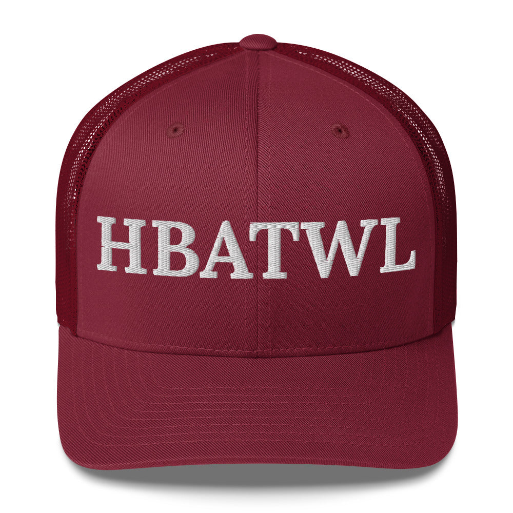 Front facing graphic trucker hat in color cranberry red, featuring the initialism 'HBATWL', in bold white embroidery. From What Was Said (Statement Apparel + More).