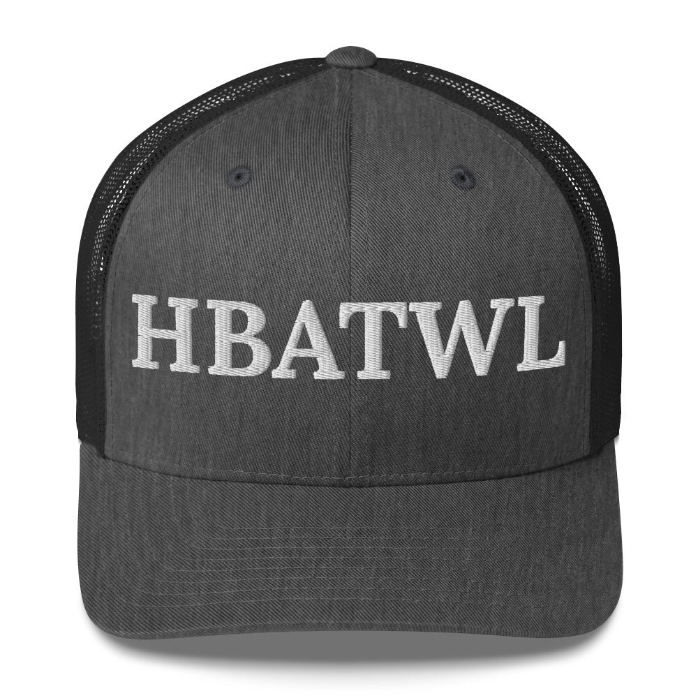 Front facing graphic trucker hat in color dark heather gray, featuring the initialism 'HBATWL', in bold white embroidery. From What Was Said (Statement Apparel + More).
