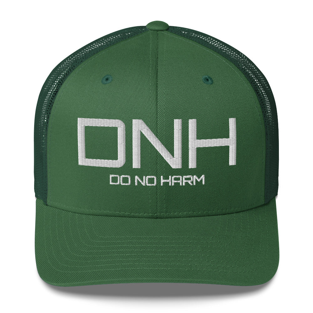 Front facing graphic trucker hat in color evergreen, featuring the initialism 'DNH', and the statement 'DO NO HARM,' in bold white embroidery. From What Was Said (Statement Apparel + More).