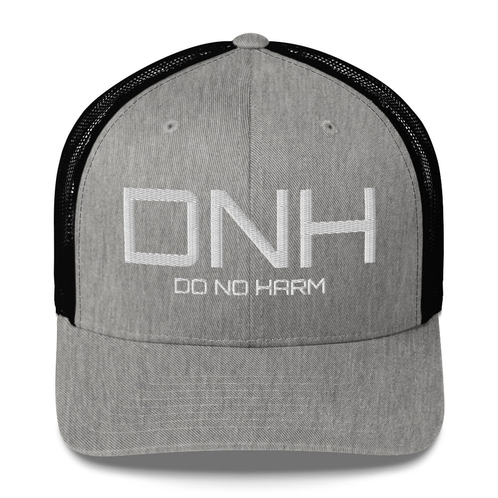 Front facing graphic trucker hat in color heather grey and black, featuring the initialism 'DNH', and the statement 'DO NO HARM,' in bold white embroidery. From What Was Said (Statement Apparel + More).