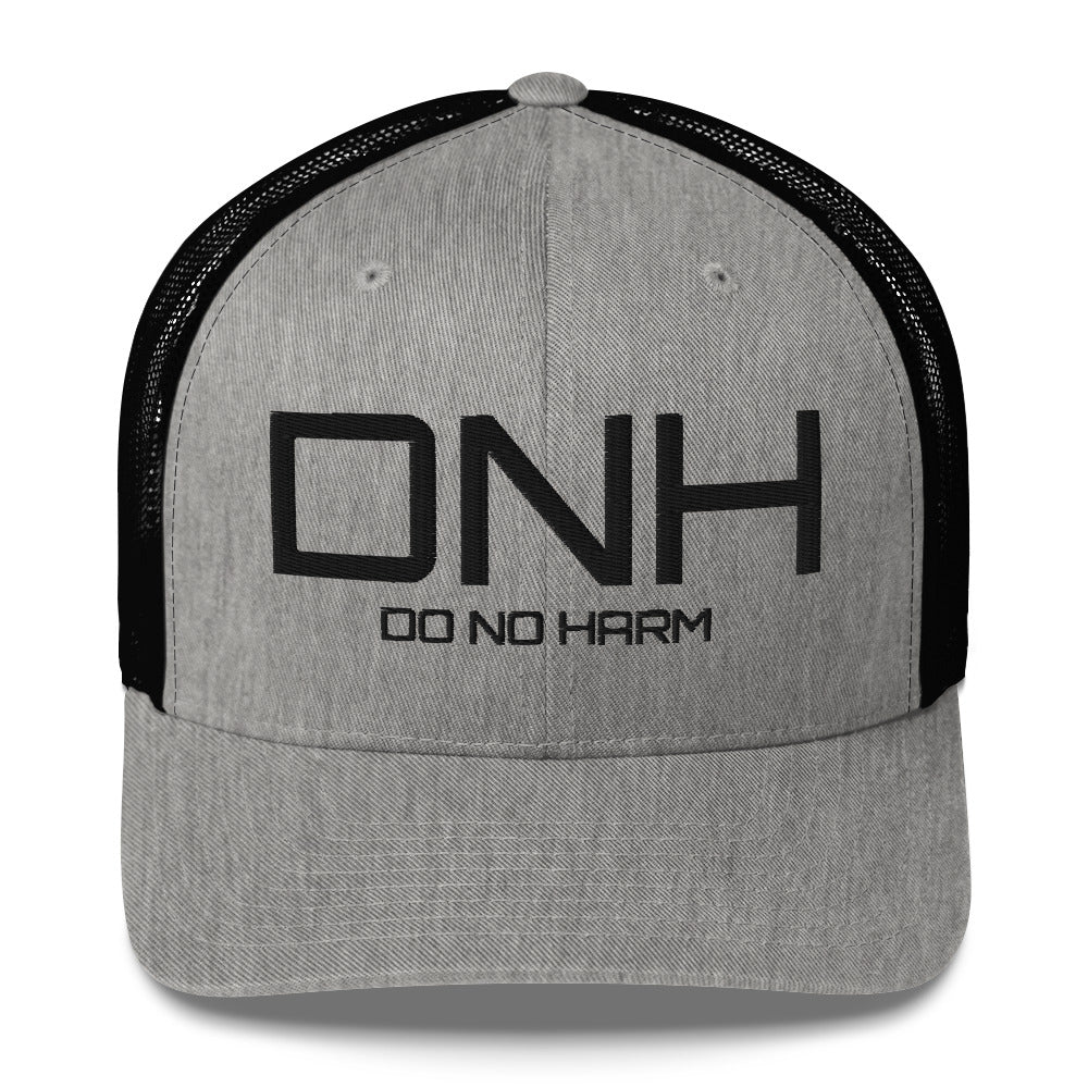 Front facing graphic trucker hat in color heather grey and black, featuring the initialism 'DNH', and the statement 'DO NO HARM,' in bold black embroidery. From What Was Said (Statement Apparel + More).