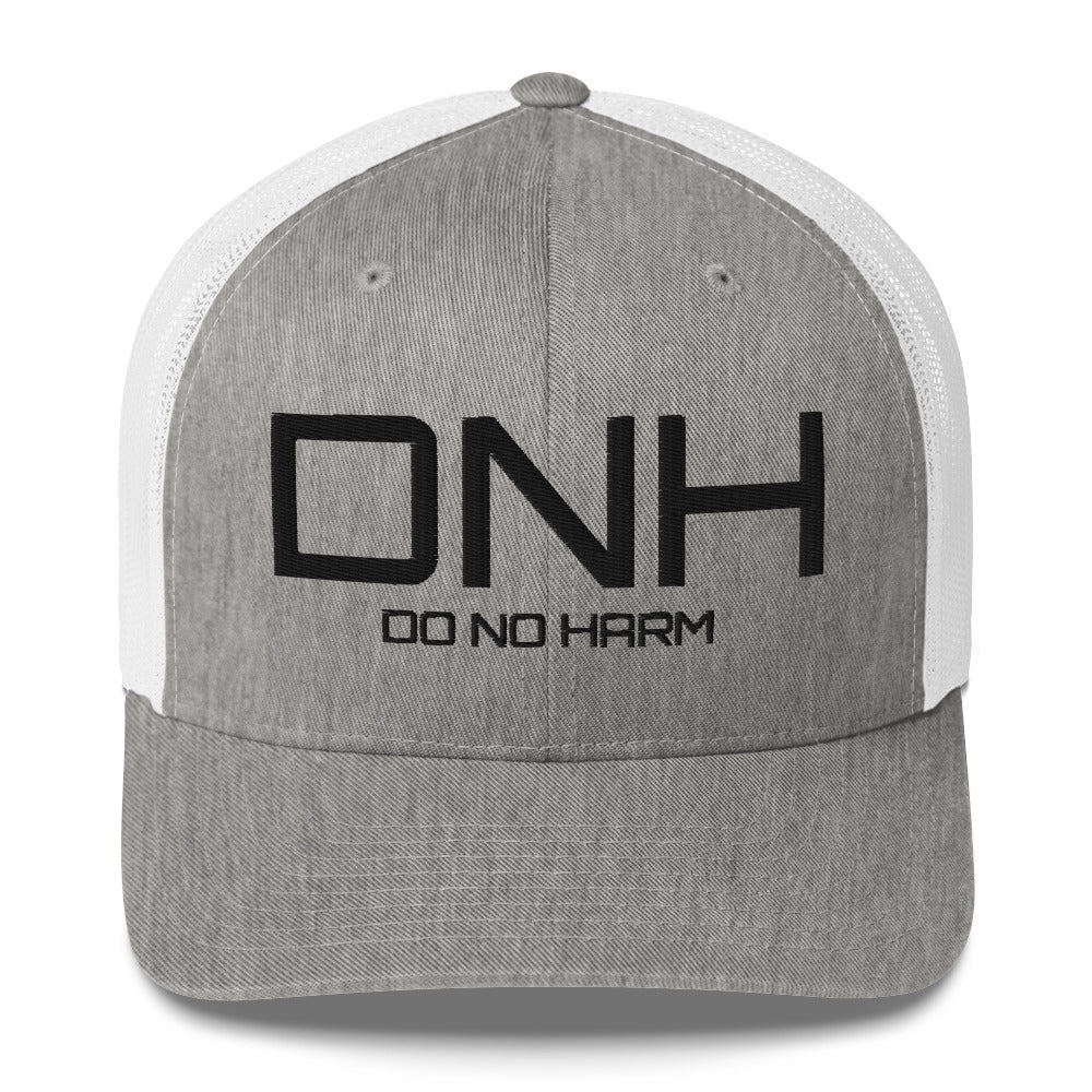Front facing graphic trucker hat in color heather grey and white, featuring the initialism 'DNH', and the statement 'DO NO HARM,' in bold black embroidery. From What Was Said (Statement Apparel + More).