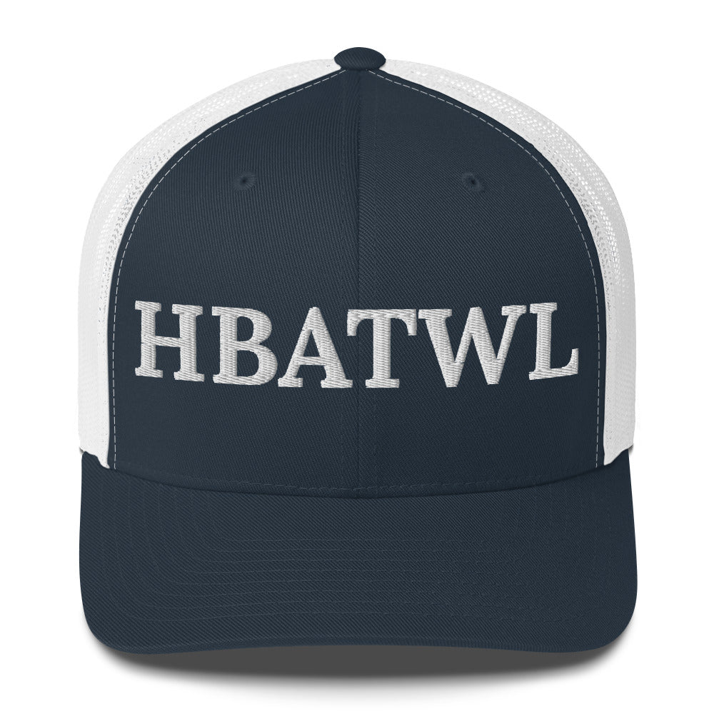 Front facing graphic trucker hat in color navy blue and white, featuring the initialism 'HBATWL', in bold white embroidery. From What Was Said (Statement Apparel + More).