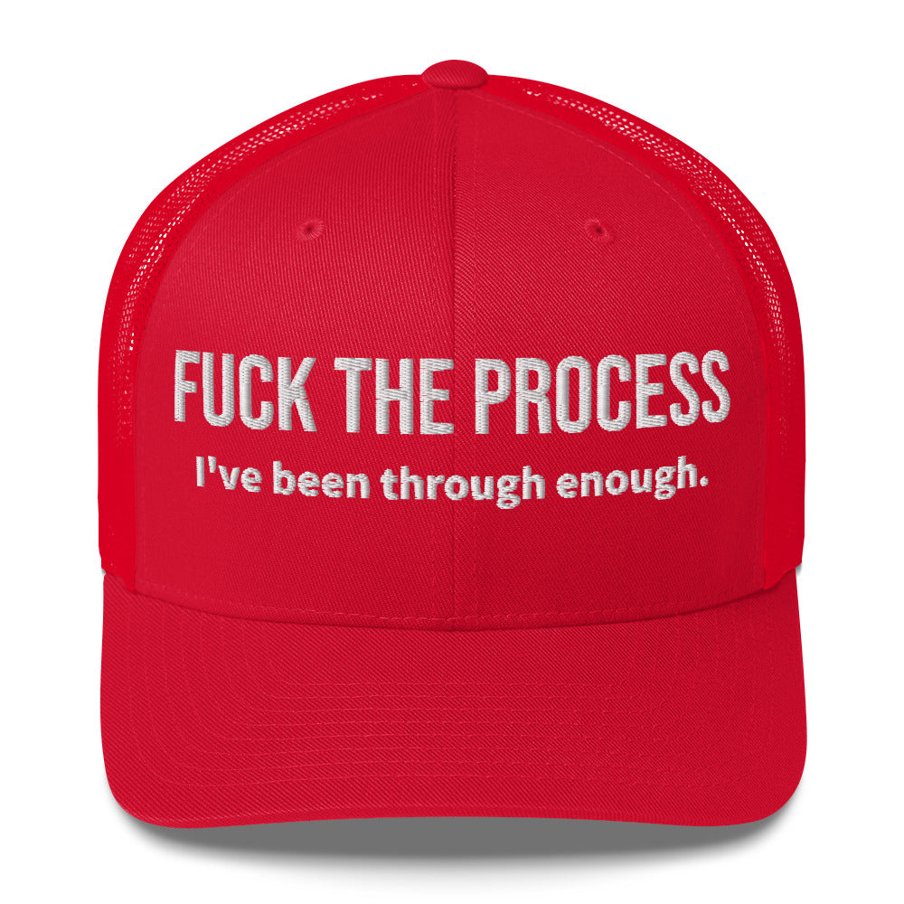 Front facing graphic trucker hat in color red, featuring the statement 'FUCK THE PROCESS, I've Been Through Enough,' in bold white embroidery. From What Was Said (Statement Apparel + More).