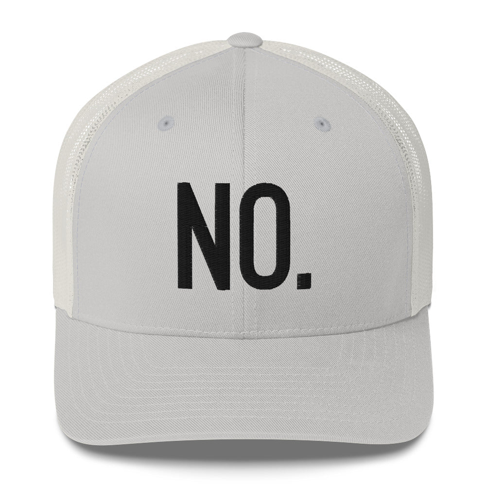 Front facing graphic trucker hat in color silver light grey, featuring the statement 'NO.' in bold black embroidery. From What Was Said (Statement Apparel + More).