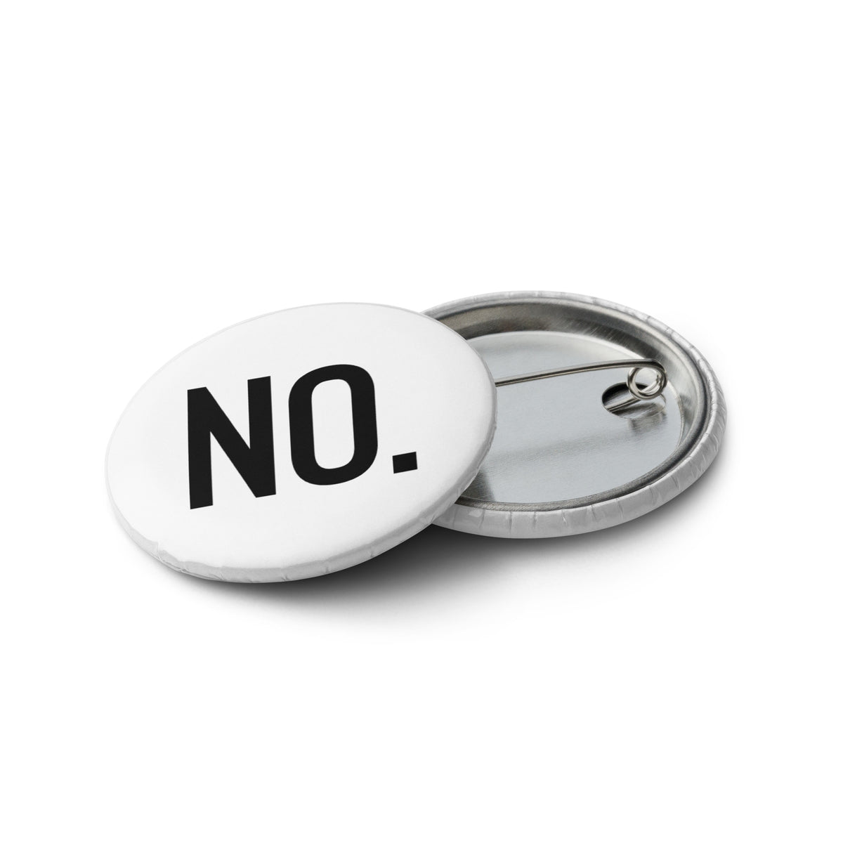 Front and back facing graphic pin buttons against a white background. Buttons are in color white and size 1.25 inches. Featuring a safety pin type clasp, and the statement 'NO.' in bold black print. From What Was Said (Statement Apparel + More). 