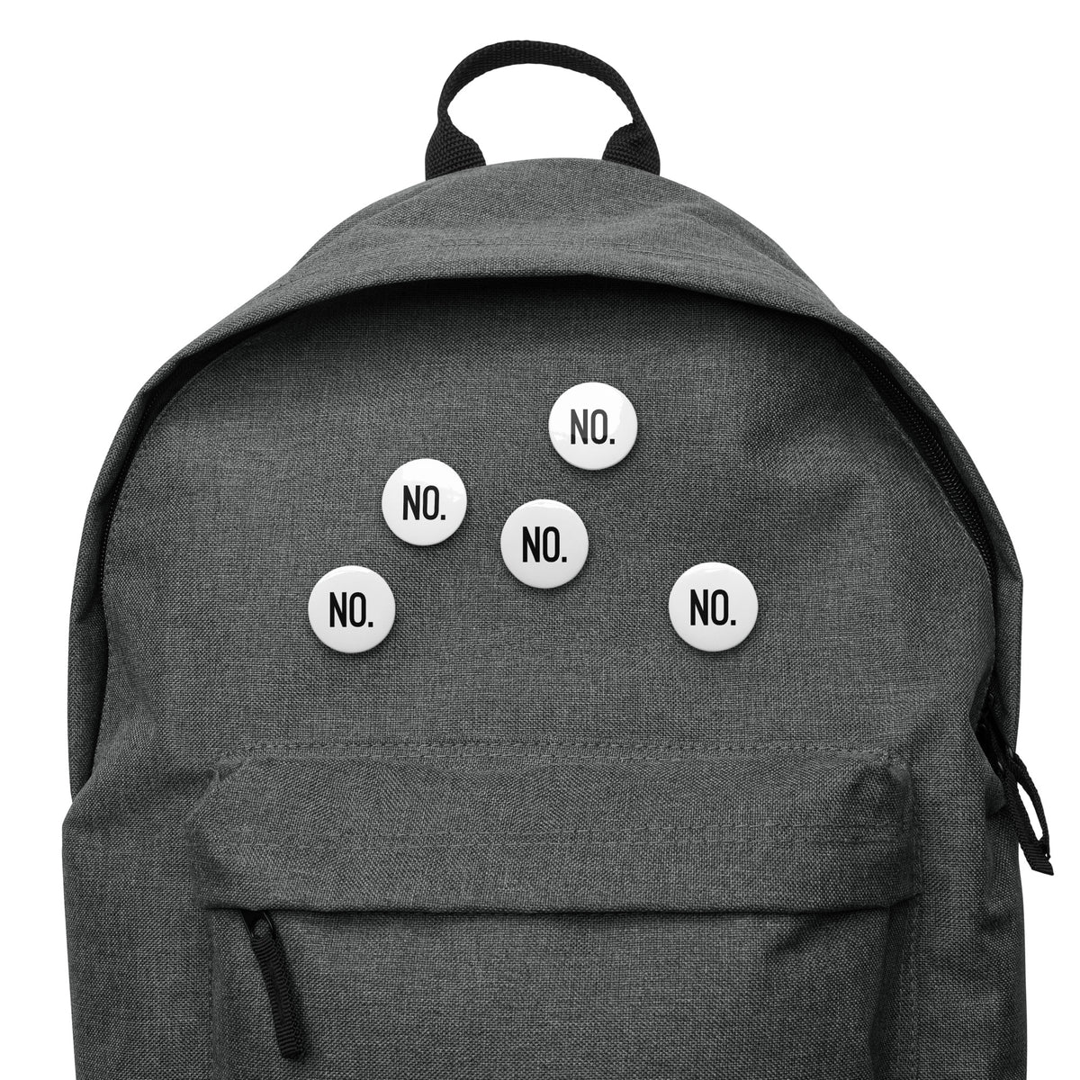 Front facing graphic pin buttons, pinned to a grey bookbag. Buttons are in color white and size 1.25 inches. Featuring the statement NO in bold black print. From What Was Said (Statement Apparel + More). 