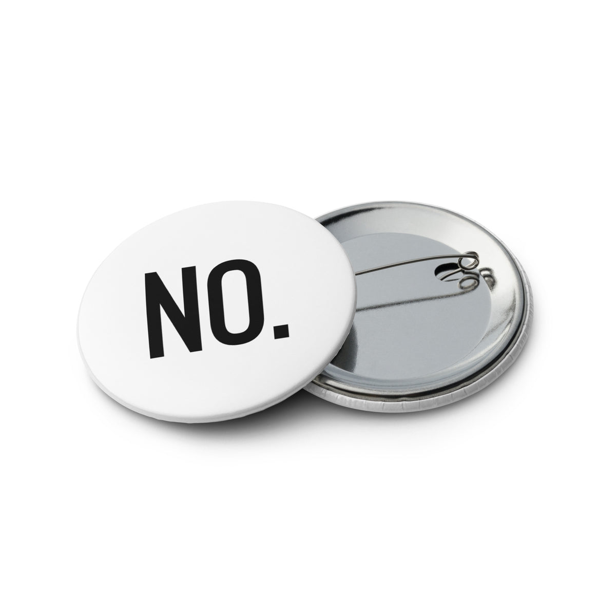 Front and back facing graphic pin buttons against a white background. Buttons are in color white and size 2.25 inches. Featuring a safety pin type clasp, and the statement 'NO.' in bold black print. From What Was Said (Statement Apparel + More). 