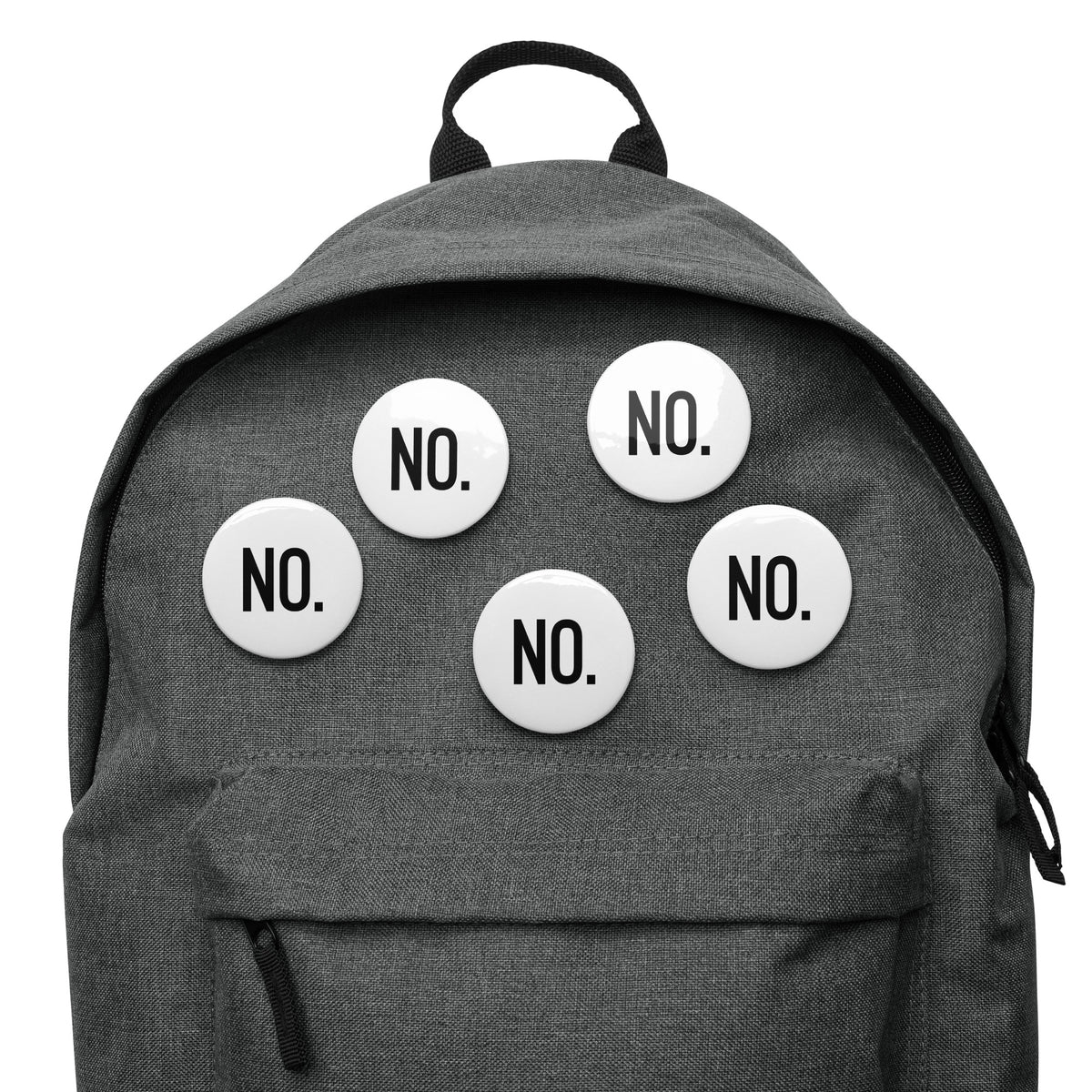 Front facing graphic pin buttons, pinned to a grey bookbag. Buttons are in color white and size 2.25 inches. Featuring the statement NO in bold black print. From What Was Said (Statement Apparel + More). 
