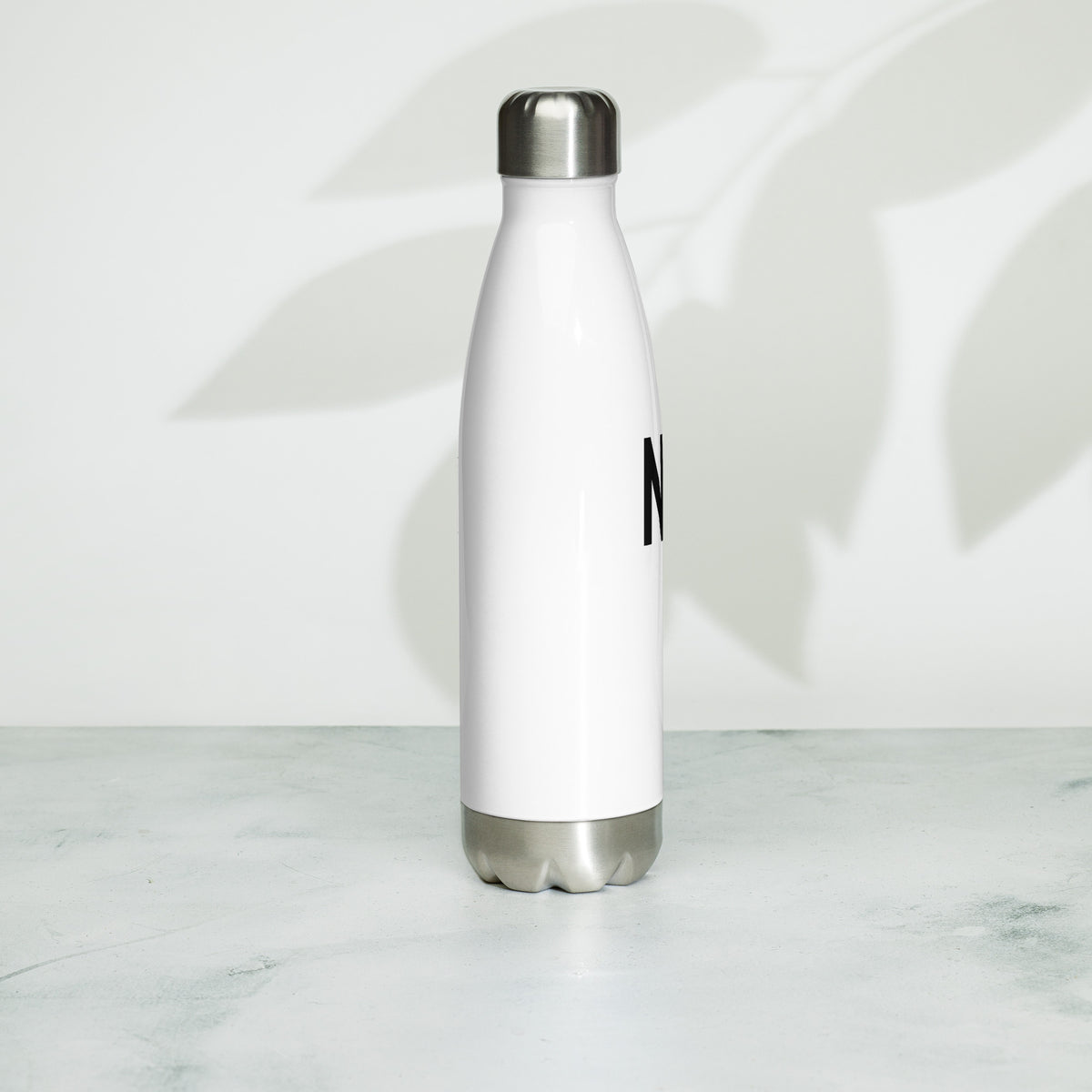 Right side facing graphic water bottle in color white, against white background. From What Was Said (Statement Apparel + More). 