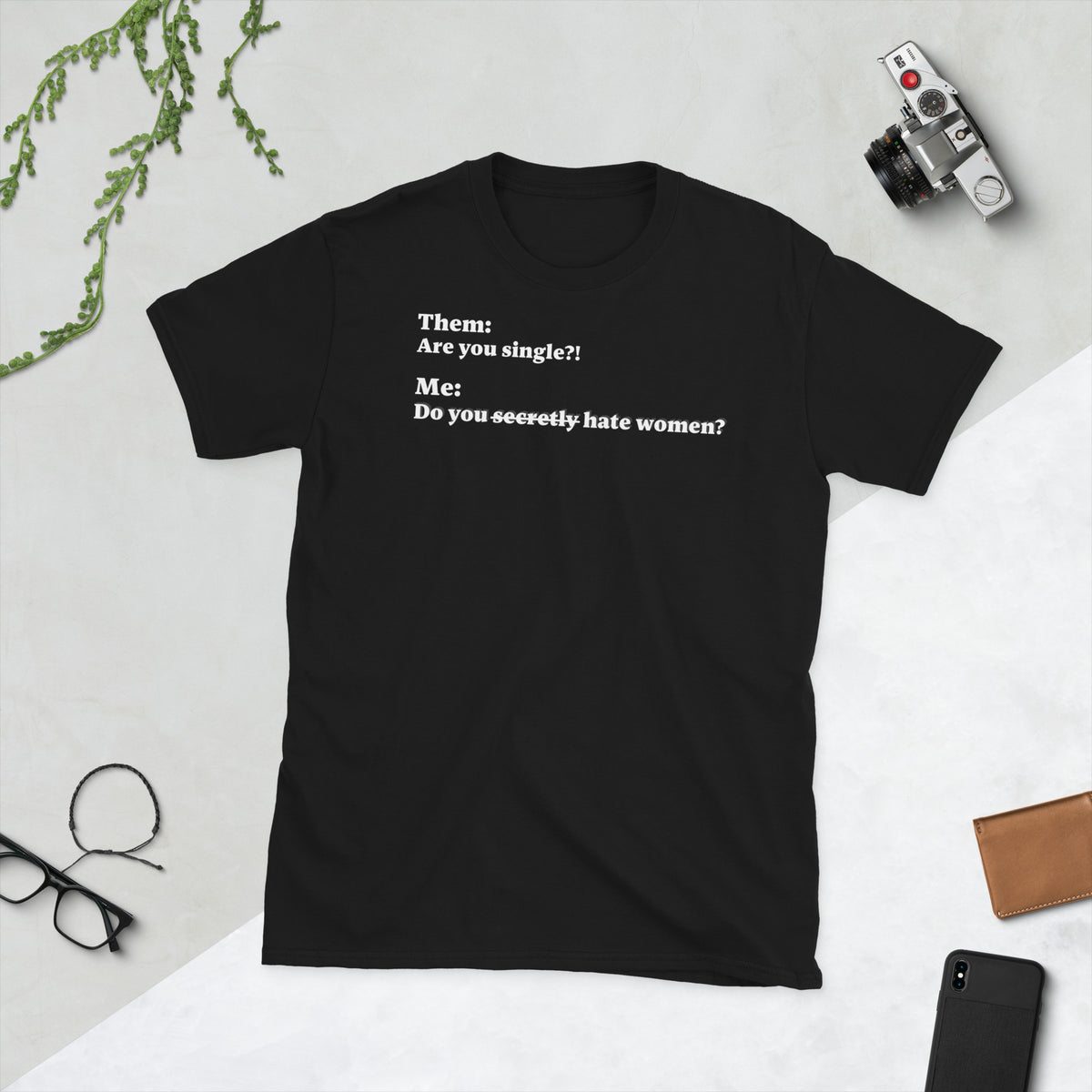 Front facing graphic T-shirt in color black, featuring an asked question, 'Are you single?' and a response, 'Do you secretly hate women?' in white print, from What Was Said (Statement Apparel + More).  