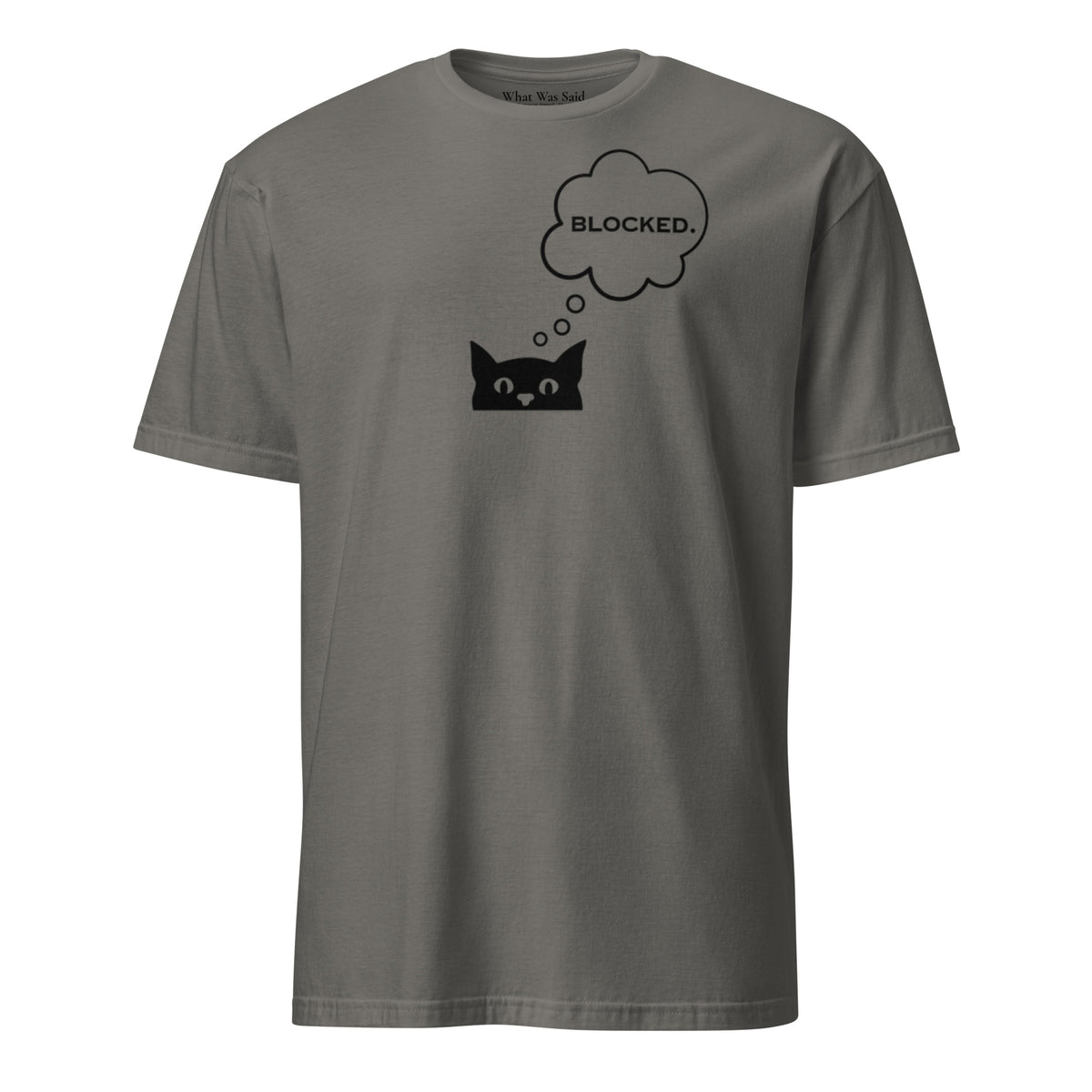 Front facing graphic T-shirt in color charcoal grey, featuring printed image of cat with thought bubble, and the written  word 'BLOCKED', inside the bubble in black print. From What Was Said (Statement Apparel + More). 