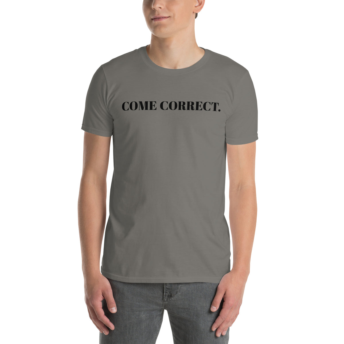 Model is wearing left front facing graphic t-shirt in color charcoal grey, featuring statement 'COME CORRECT', in bold black print. From What Was Said (Statement Apparel + More).