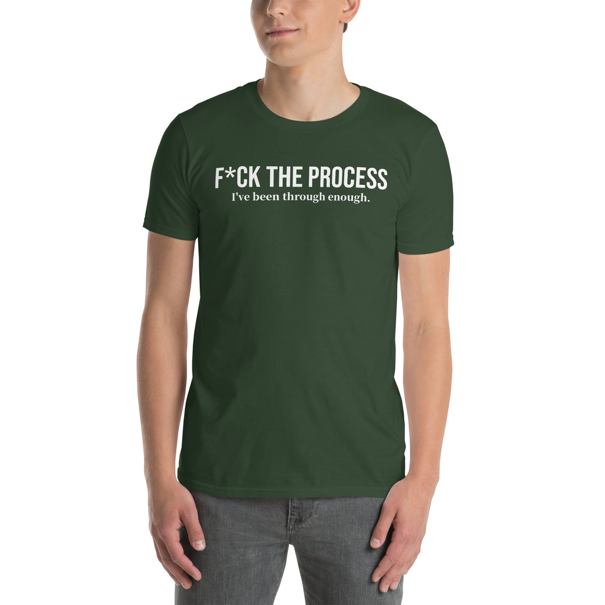 Model wearing front facing graphic t-shirt in color forest green, featuring statement, 'F*CK THE PROCESS, I've been through enough', in bold white print. From What Was Said (Statement Apparel + More).