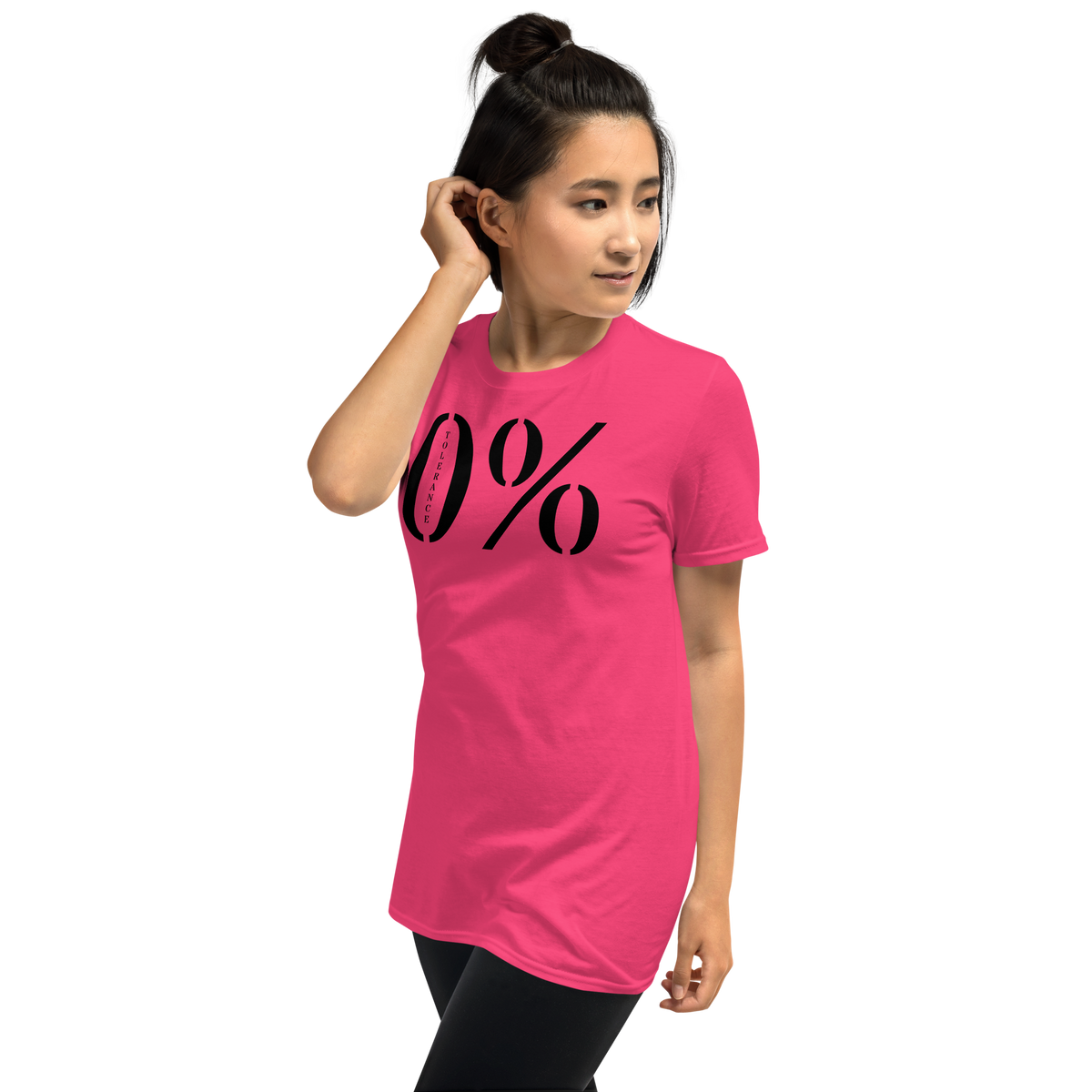 Model is wearing left front facing graphic t-shirt in color heliconia pink featuring a large zero percent symbol and the written word, 'TOLERANCE', in bold black print. From What Was Said (Statement Apparel + More).