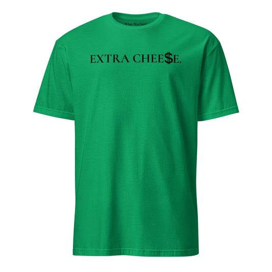 Front facing graphic T-shirt in color irish-green, featuring statement 'EXTRA CHEESE', with dollar sign symbol in place of the letter S in the word cheese, in black print. From What Was Said (Statement Apparel + More).