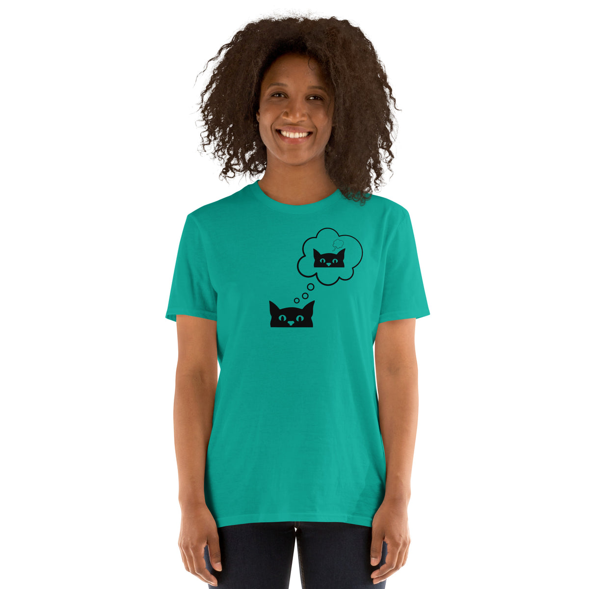 Model wearing front facing graphic T-shirt in color jade dome green, featuring printed image of cat with thought bubble, and duplicate cat image inside the thought bubble, in black print. From What Was Said (Statement Apparel + More). 
