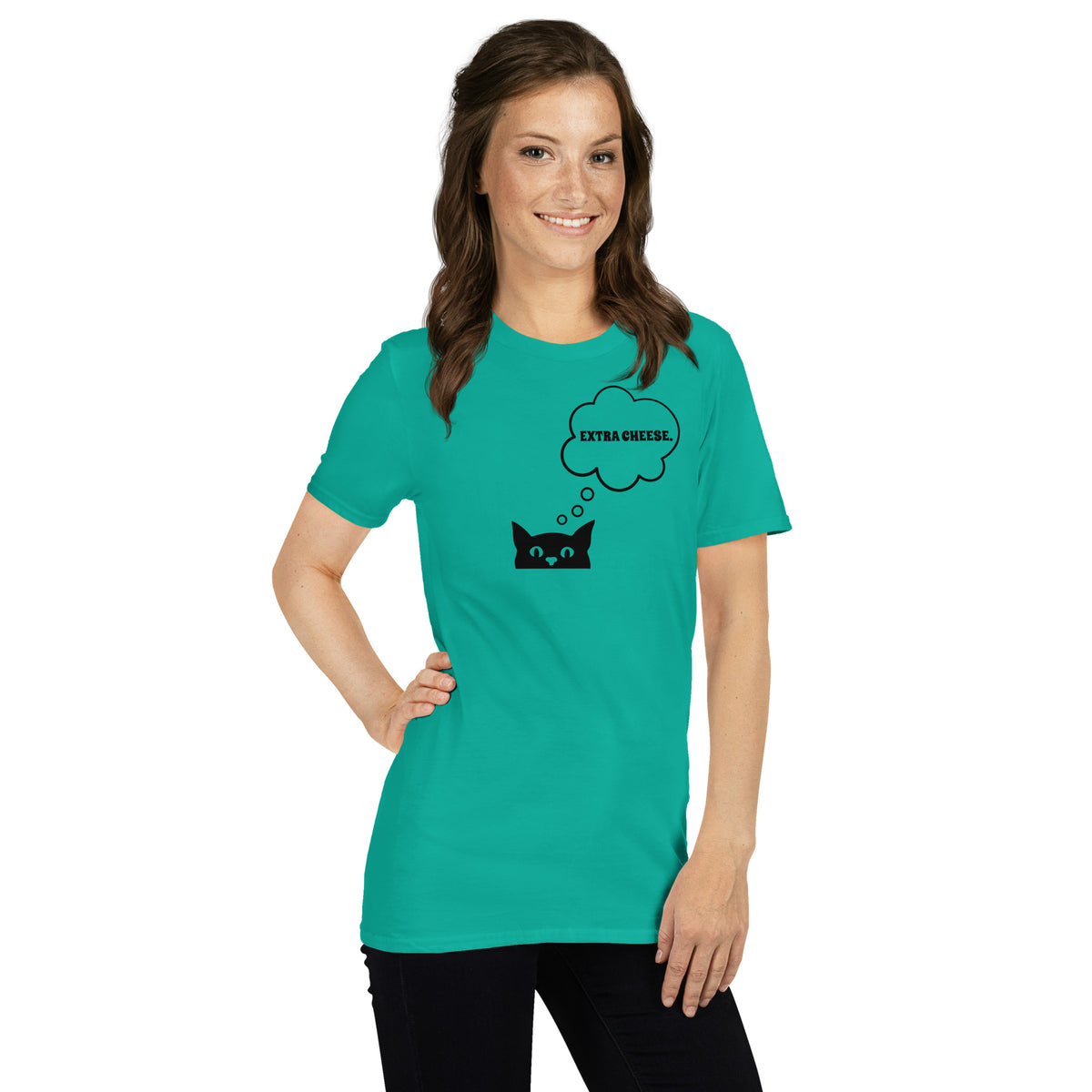 Model wearing front facing graphic T-shirt in color jade dome green, featuring printed image of cat with thought bubble, and the words 'EXTRA CHEESE', inside the bubble in black print. From What Was Said (Statement Apparel + More). 