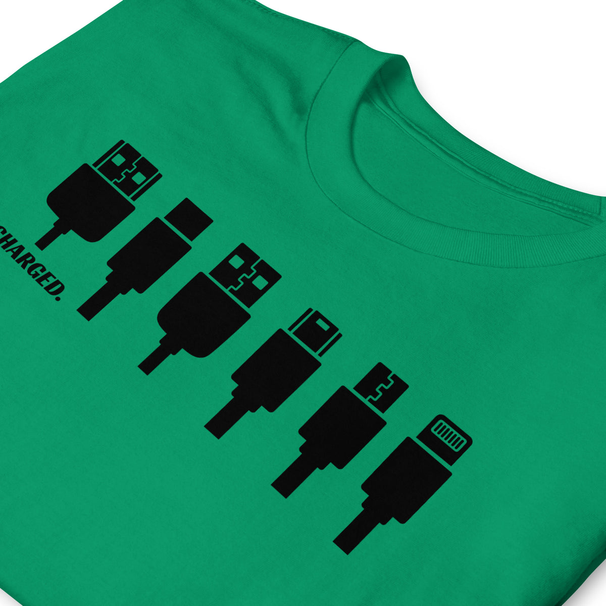 Folded front facing graphic T-shirt in color kelly-green, featuring printed zoomed in image of various device chargers and the written word 'CHARGED' in black print. From What Was Said (Statement Apparel + More).