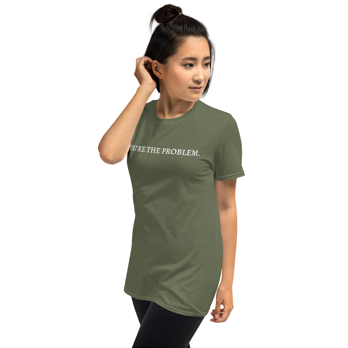 Model is wearing left front facing graphic t-shirt in color military green featuring statement, 'YOU'RE THE PROBLEM', in bold white print. From What Was Said (Statement Apparel + More).