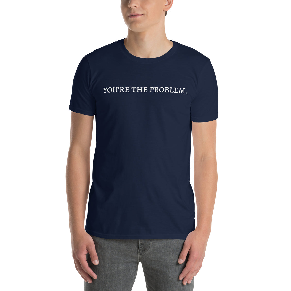 Model is wearing front facing graphic t-shirt in color navy blue featuring statement, 'YOU'RE THE PROBLEM', in bold white print. From What Was Said (Statement Apparel + More).