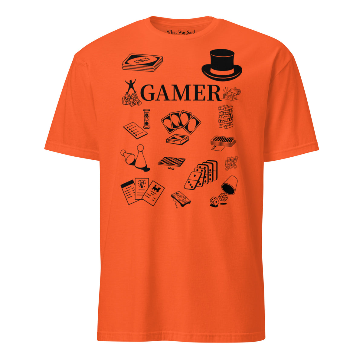 Front facing graphic T-shirt in color orange, featuring printed image of various classic board game pieces and the word 'GAMER' in black print, from What Was Said (Statement Apparel + More). 