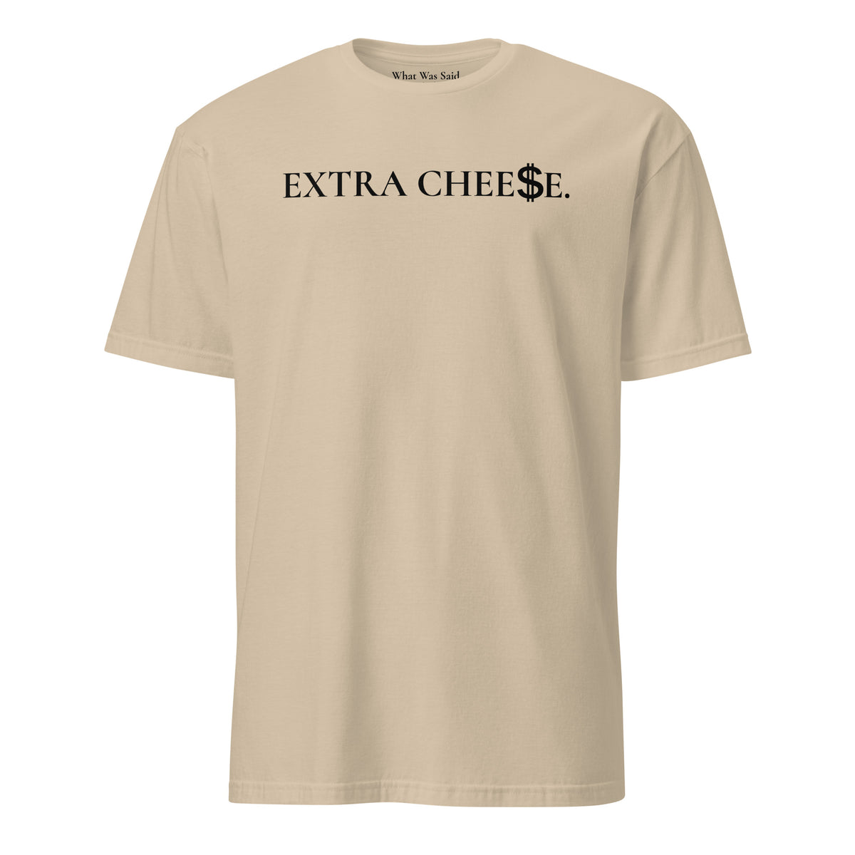 Front facing graphic T-shirt in color sand, featuring statement 'EXTRA CHEESE', with dollar sign symbol in place of the letter S in the word cheese, in black print. From What Was Said (Statement Apparel + More).