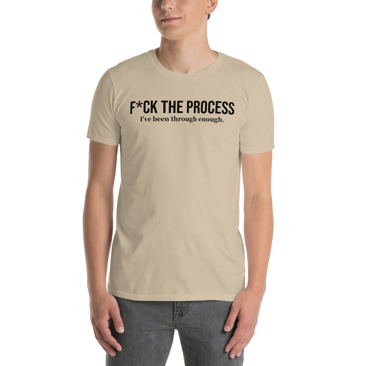 Model is wearing front facing graphic t-shirt in color sand, featuring statement, 'F*CK THE PROCESS, I've been through enough', in bold black print. From What Was Said (Statement Apparel + More).
