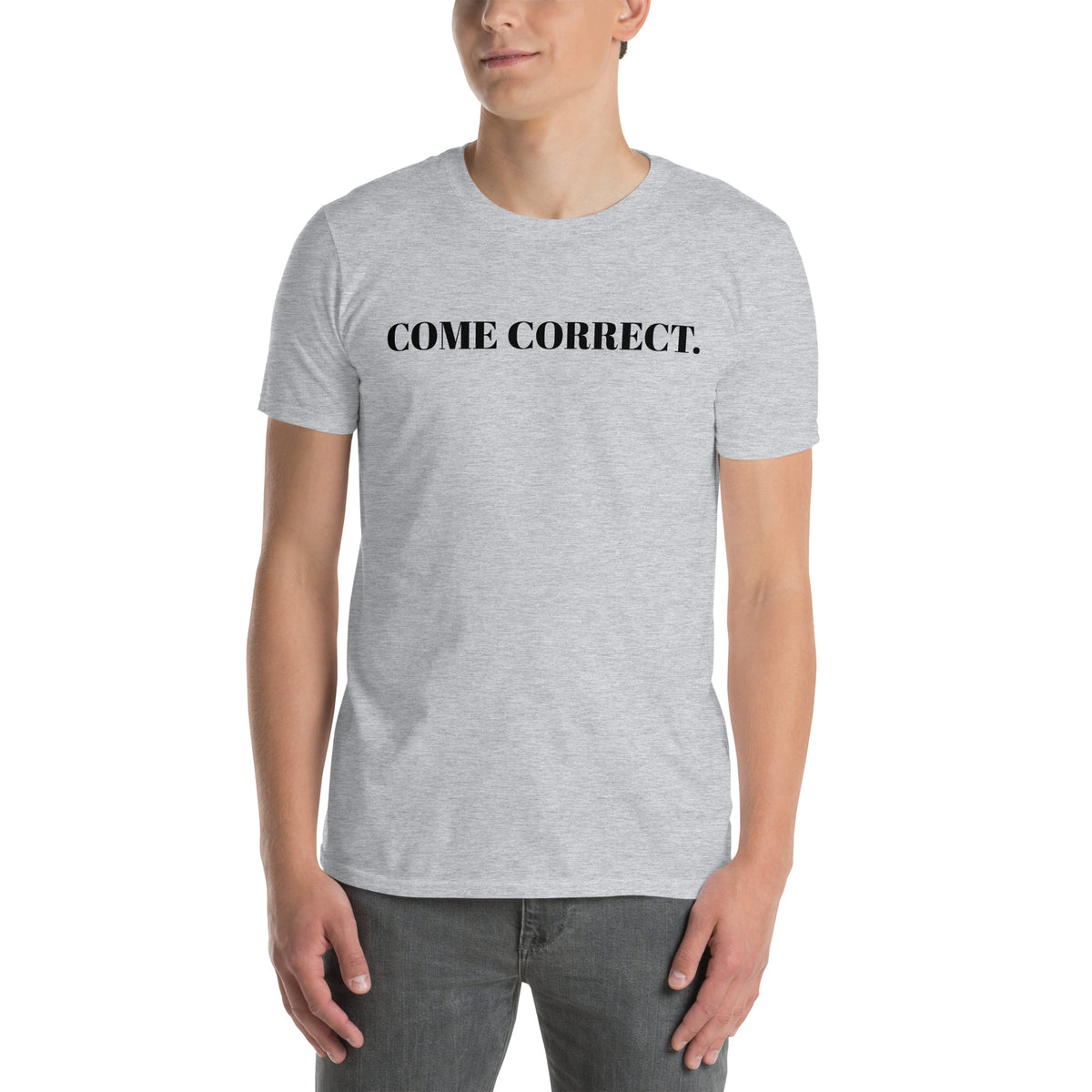 Model is wearing left front facing graphic t-shirt in color sport grey, featuring statement 'COME CORRECT', in bold black print. From What Was Said (Statement Apparel + More).