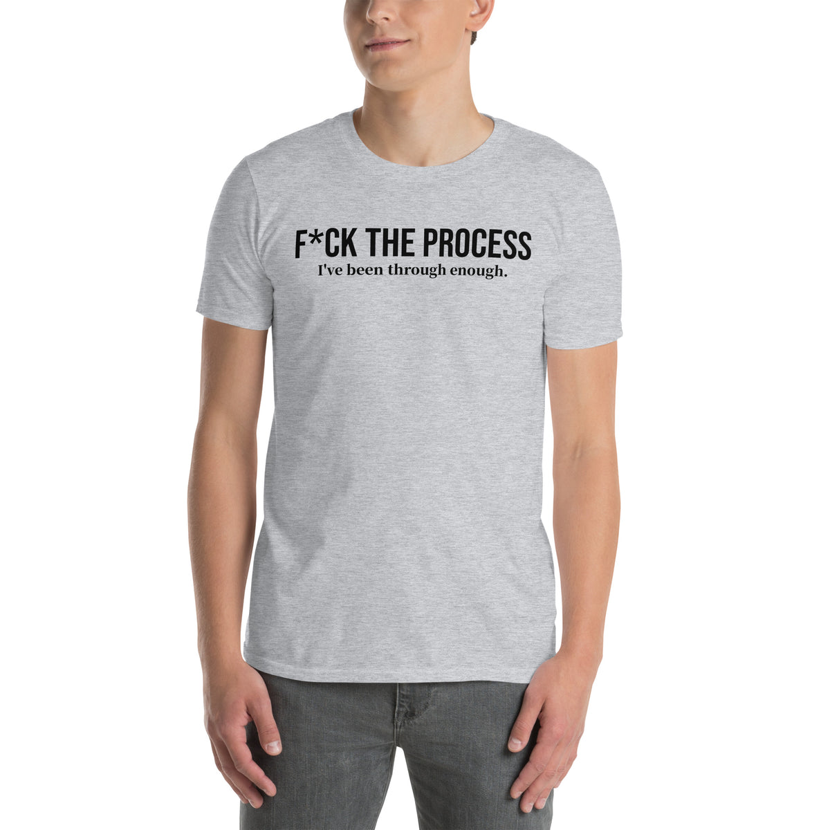 Model is wearing front facing graphic t-shirt in color sport grey, featuring statement, 'F*CK THE PROCESS, I've been through enough', in bold black print. From What Was Said (Statement Apparel + More).